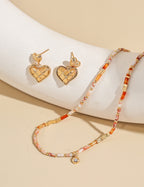 SENLORE Sterling Silver Heart Earrings – Lifestyle Shot