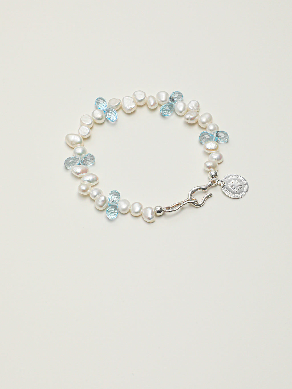 Blue Topaz Teardrop Pearl Bracelet — three-seven-hole double-sided baroque pearl, faceted blue topaz teardrop, large-hole sterling silver round bead | SENLORE