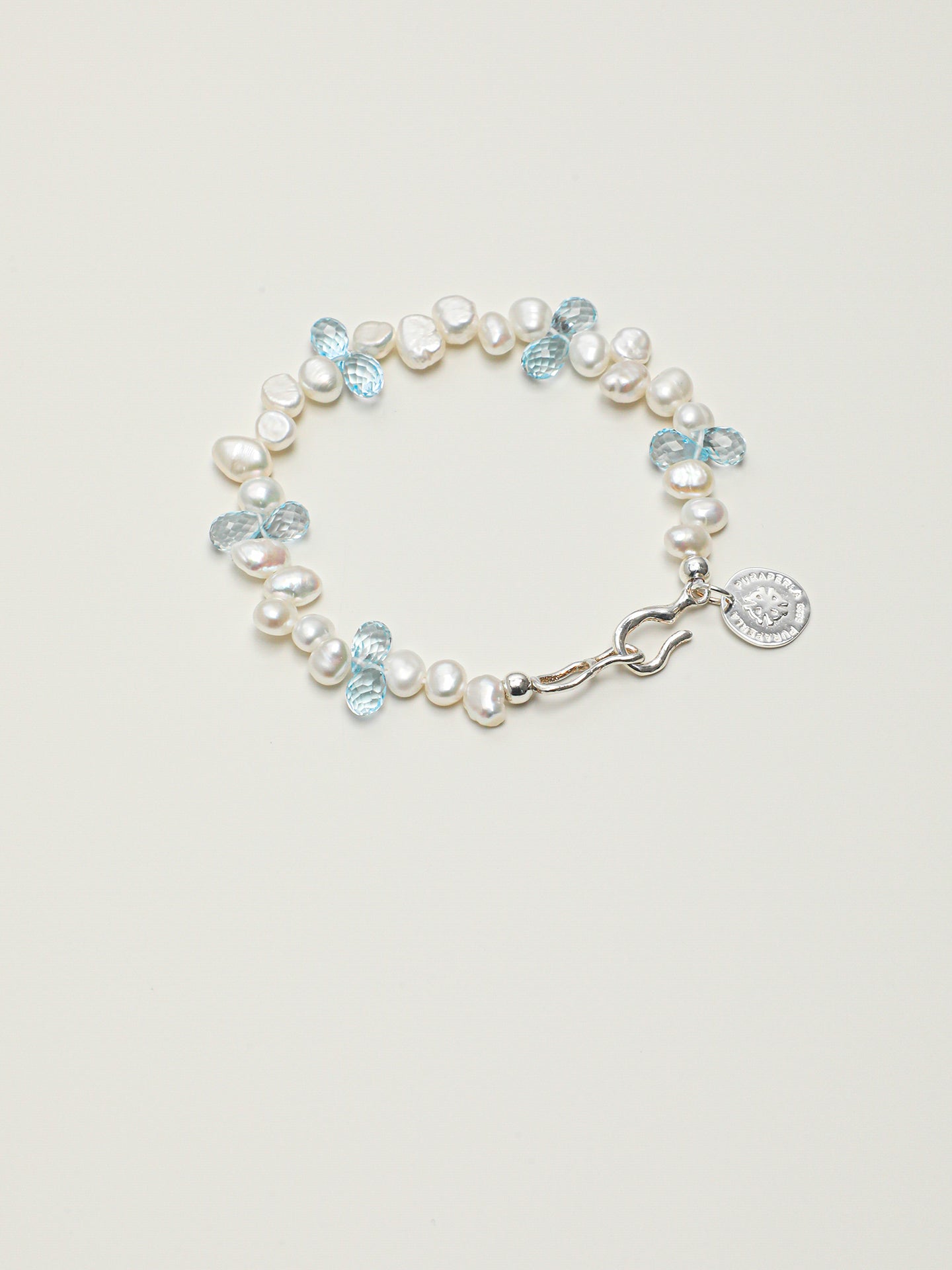 Blue Topaz Teardrop Pearl Bracelet — three-seven-hole double-sided baroque pearl, faceted blue topaz teardrop, large-hole sterling silver round bead | SENLORE