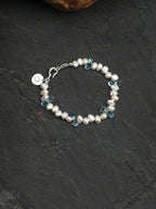Blue Topaz Teardrop Pearl Bracelet — three-seven-hole double-sided baroque pearl, faceted blue topaz teardrop, large-hole sterling silver round bead | SENLORE