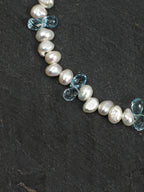 Blue Topaz Teardrop Pearl Bracelet — three-seven-hole double-sided baroque pearl, faceted blue topaz teardrop, large-hole sterling silver round bead | SENLORE