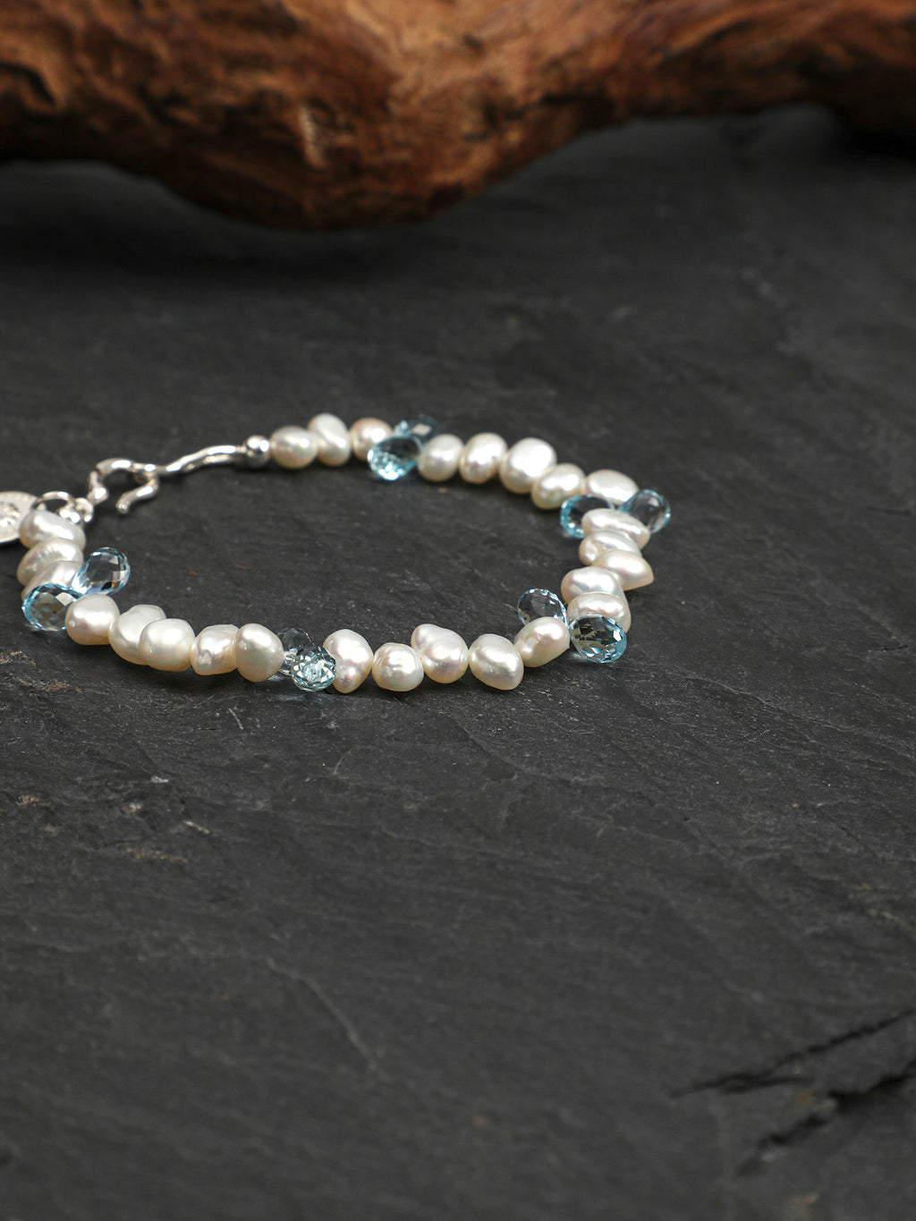 Blue Topaz Teardrop Pearl Bracelet — three-seven-hole double-sided baroque pearl, faceted blue topaz teardrop, large-hole sterling silver round bead | SENLORE