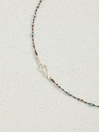 Iridescent Mood Necklace — faceted blue topaz teardrop, plump citrine teardrop, flat-cut green crystal teardrop | SENLORE
