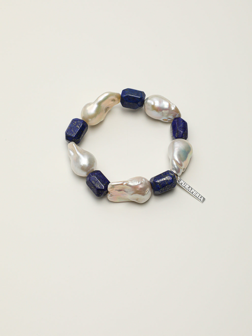 Large Baroque Lapis Lazuli Bracelet — large baroque pearl, freeform lapis lazuli, sterling silver logo charm | SENLORE