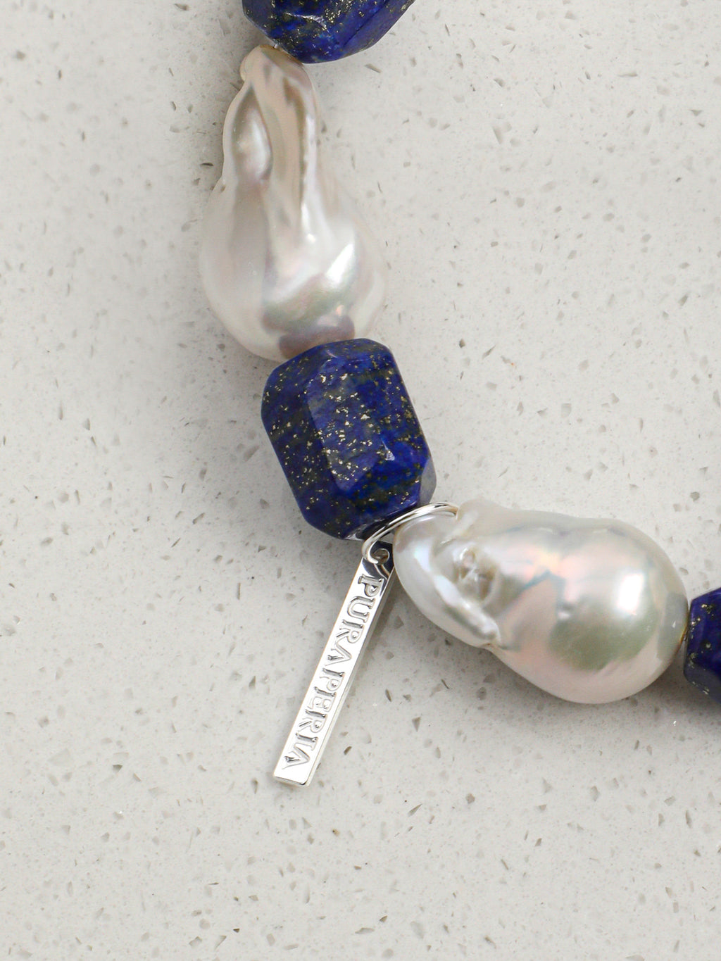 Large Baroque Lapis Lazuli Bracelet — large baroque pearl, freeform lapis lazuli, sterling silver logo charm | SENLORE