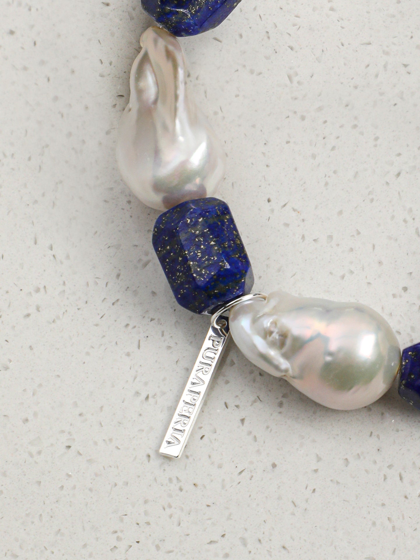 Large Baroque Lapis Lazuli Bracelet — large baroque pearl, freeform lapis lazuli, sterling silver logo charm | SENLORE