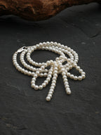 Classic Elegance Bow-Knot Pearl Necklace — natural seed pearls, sterling silver large-hole bead... | SENLORE