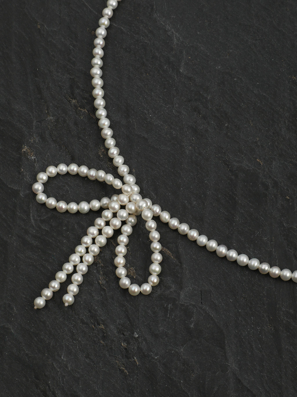 Classic Elegance Bow-Knot Pearl Necklace — natural seed pearls, sterling silver large-hole bead... | SENLORE
