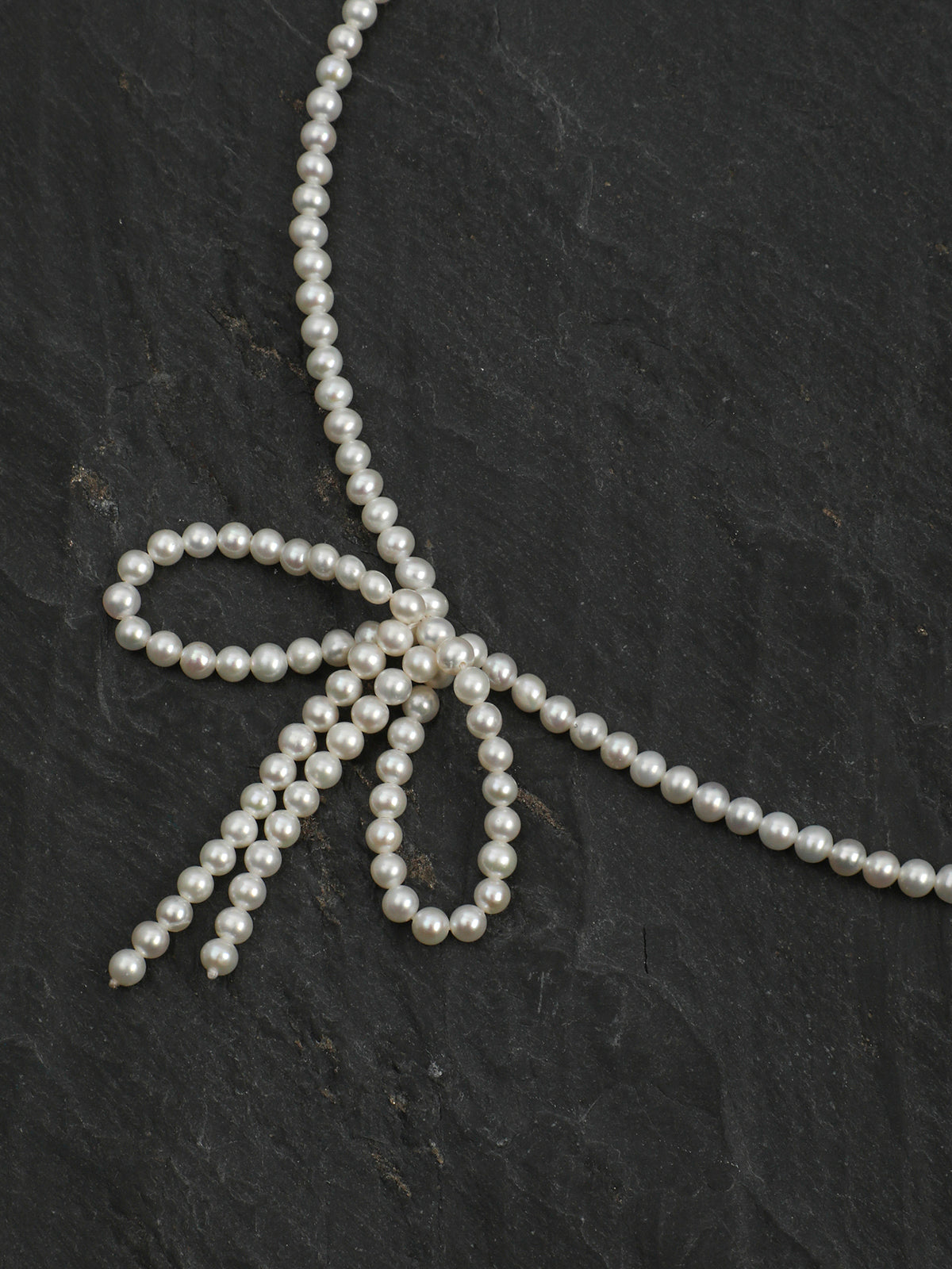 Classic Elegance Bow-Knot Pearl Necklace — natural seed pearls, sterling silver large-hole bead... | SENLORE