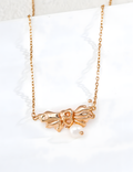 SENLORE Vintage Wing Pearl Necklace – Front View