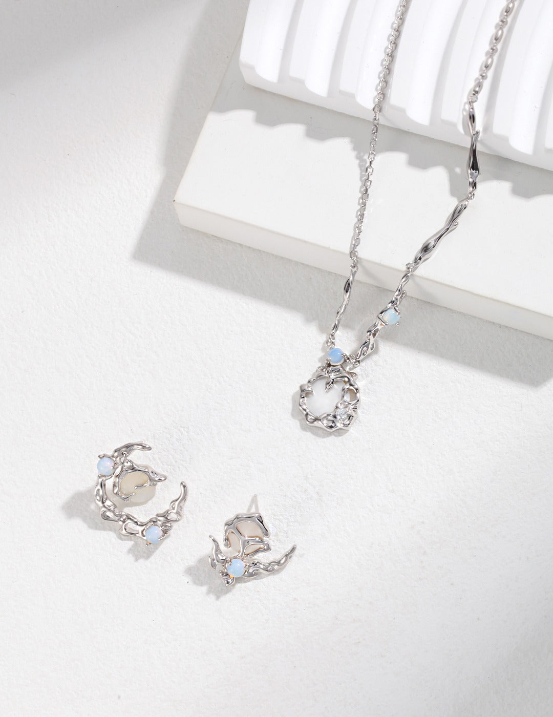 SENLORE Moon Asymmetric Earrings – Lifestyle Shot